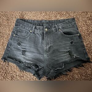 Distressed black denim shorts. Size medium